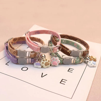 Adjustable Pet Collar with Bell - Colorful Paw Print for Cats & Puppies